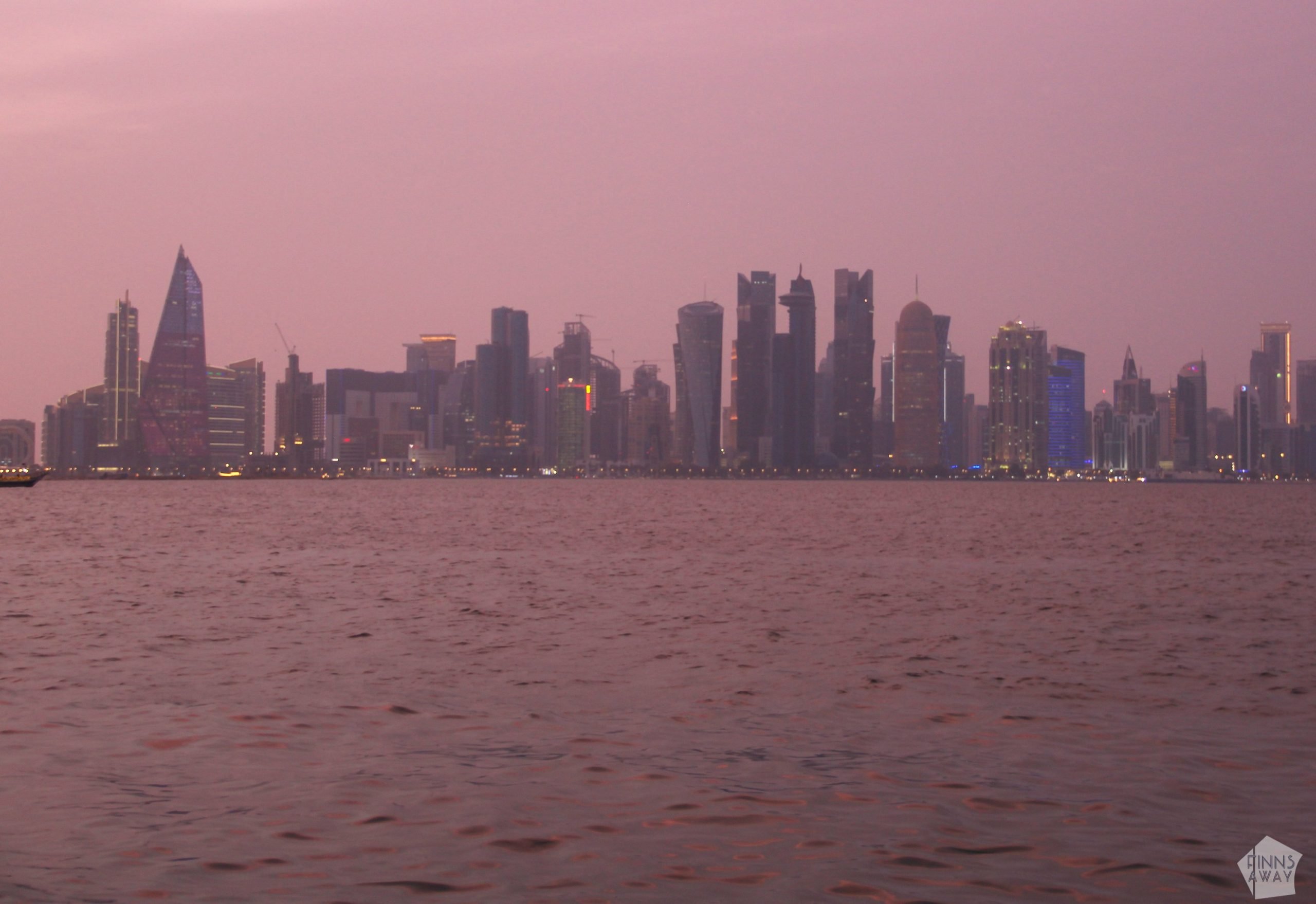 Doha skyline in sunset | To East Africa via a stopover in Doha, Qatar | FinnsAway nomadic life