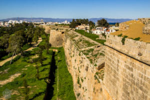 Guide on how to visit Famagusta (Gazimagusa) and what to see in the walled city. History of Famagusta in a nutshell and introduction of the main sights. | FinnsAway Travel Blog