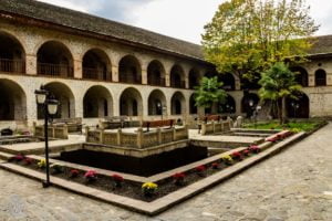 Travel to Shaki (Sheki) in northern Azerbaiajan to see royal palaces, historic caravanserais, beautiful architecture and forested mountains. | FinnsAway Travel Blog