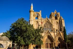 Guide on how to visit Famagusta (Gazimagusa) and what to see in the walled city. History of Famagusta in a nutshell and introduction of the main sights. | FinnsAway Travel Blog