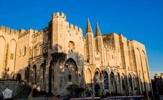 The medieval old town of Avignon is a wonderful travel destination | Gothic-style Palais des Papes | FinnsAway Travel Blog