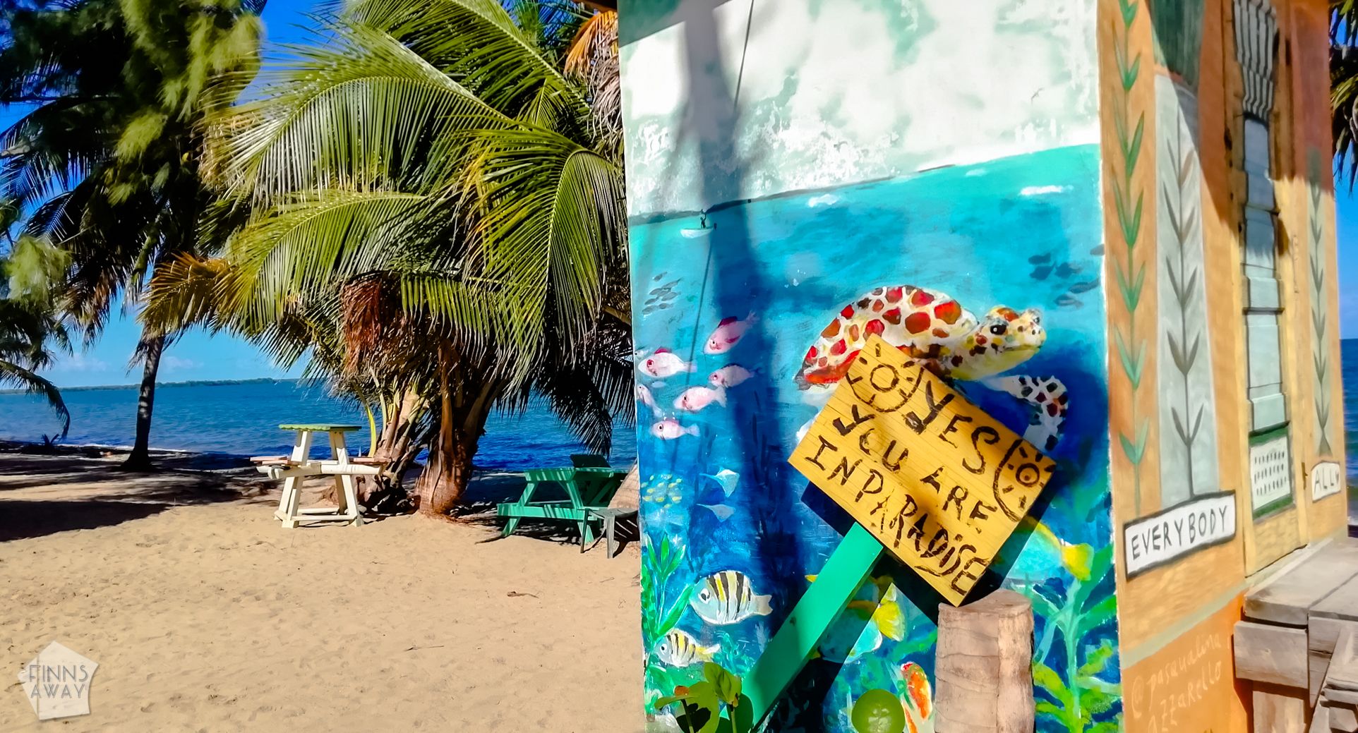 Beach paradise sign | Travel guide to Hopkins, Belize | FinnsAway Travel Blog